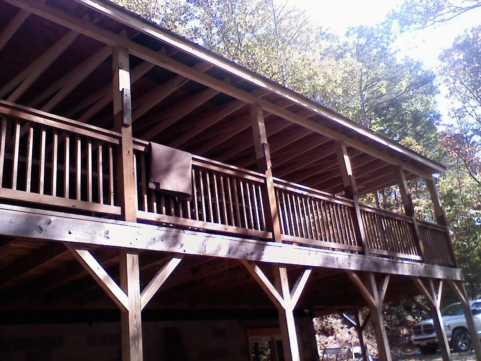 Timber framing under a new elevated porch and deck — Roof Leak Repair in Narragansett by Roofing Brothers